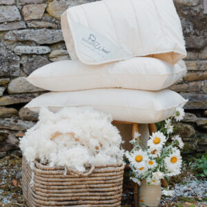 wool duvet and pillow set with raw wool and flowers